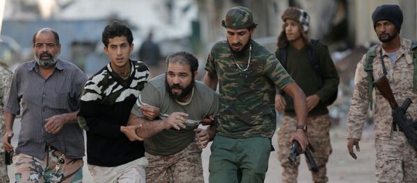 عناصر الجيش الوطني الليبي خلال مواجهة إرهابيي تنظيم داعش في بنغازي، ليبيا 9 نوفمبر/ تشرين الثاني 2017 - سبوتنيك عربي