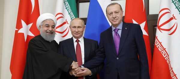 لقاء ثلاثي يجمع بوتين مع أردوغان وروحاني في سوتشي، 22 نوفمبر 2017 لقاء ثلاثي يجمع بوتين مع أردوغان وروحاني في سوتشي، 22 نوفمبر 2017 - سبوتنيك عربي