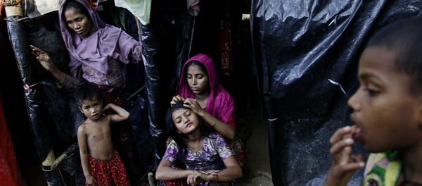 لاجئو الروهينغا في مخيم للاجئين بالوخالي على الحدود بين ميانمار وبنغلادش لاجئو الروهينغا في مخيم للاجئين بالوخالي على الحدود بين ميانمار وبنغلادش - سبوتنيك عربي