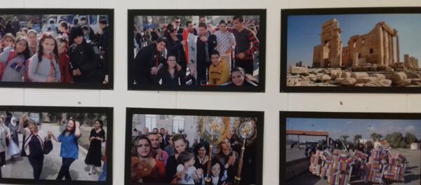 توثيق روسي لمعاناة الشعب السوري بمعرض سوريا التي ستنتصر توثيق روسي لمعاناة الشعب السوري بمعرض سوريا التي ستنتصر - سبوتنيك عربي