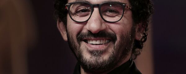 الممثل المصري أحمد حلمي في حفل افتتاح مهرجان القاهرة السينمائي الدولي الـ 39 الممثل المصري أحمد حلمي في حفل افتتاح مهرجان القاهرة السينمائي الدولي الـ 39 - سبوتنيك عربي