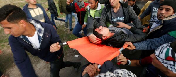 إصابات بين الفلسطينيين في قطاع غزة - سبوتنيك عربي