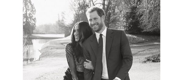 الأمير هاري مع خطيبته ميغان ماركل - سبوتنيك عربي