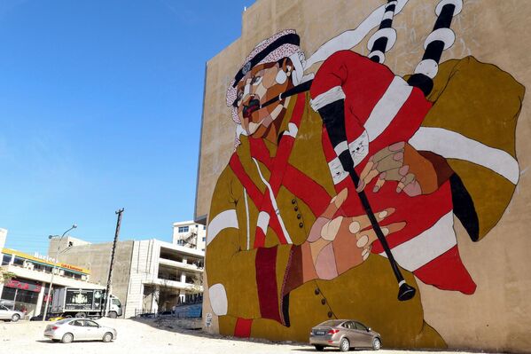 رسم غرافيتي في شوارع عمان، روسيا 18 ديسمبر/ كانون الأول 2017 - سبوتنيك عربي