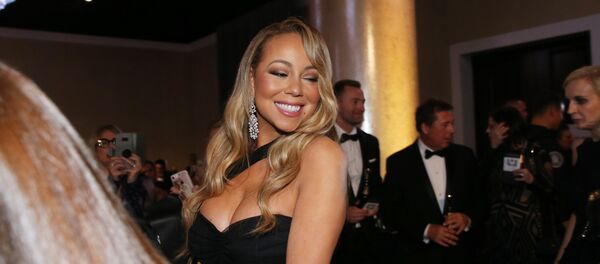 المطربة الأمريكية ماريا كاري في الحفل الـ 75 لتوزيع جوائز غولدن غلوب في مدينة لوس أنجلوس الأمريكية - سبوتنيك عربي