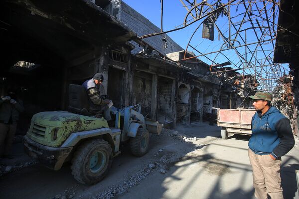 حجم الدمار الذي لحق المحال التجارية في الموصل  - سبوتنيك عربي