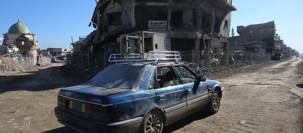 حجم الدمار في أحدى شوارع الموصل بعد تحريرها من داعش - سبوتنيك عربي