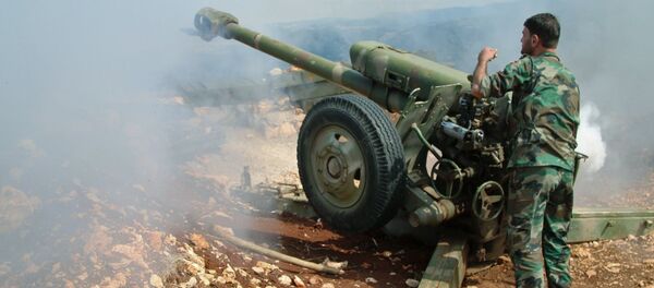 القوات الحكومية السورية تستخدم مدافه الهاوتزر - سبوتنيك عربي