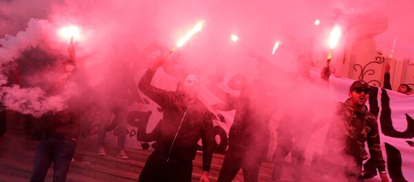 متظاهرون فى العاصمة تونس، 14 يناير/ كانون الثاني - سبوتنيك عربي