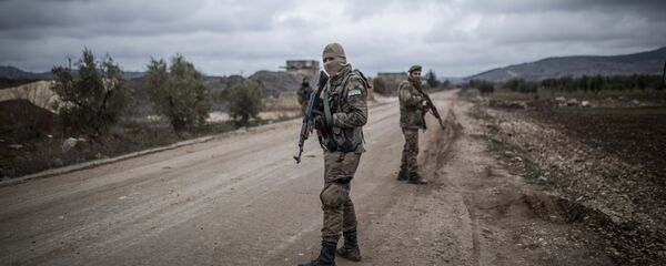 عناصر من جماعات مسلحة سورية مشاركة في عملية غصن الزيتون في عفرين السورية - سبوتنيك عربي