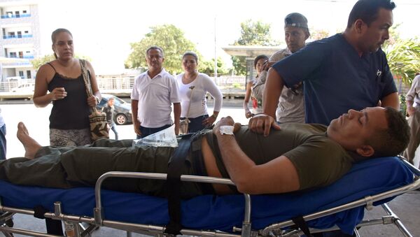 رجل شرطة كولومبي مصاب في الهجوم - سبوتنيك عربي