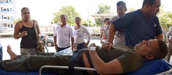 رجل شرطة كولومبي مصاب في الهجوم - سبوتنيك عربي