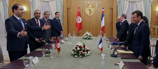 الرئيس الفرنسي في زيارته إلى تونس، الأربعاء 31 يناير/ كانون الثاني 2018 - سبوتنيك عربي