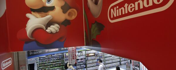 Logo of Nintendo and Super Mario characters at an electronics store in Tokyo. (File) Logo of Nintendo and Super Mario characters at an electronics store in Tokyo. (File) - سبوتنيك عربي