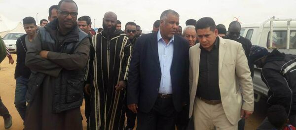 زيارة يوسف جلالة لمخيم نازحي تاورغاء - سبوتنيك عربي