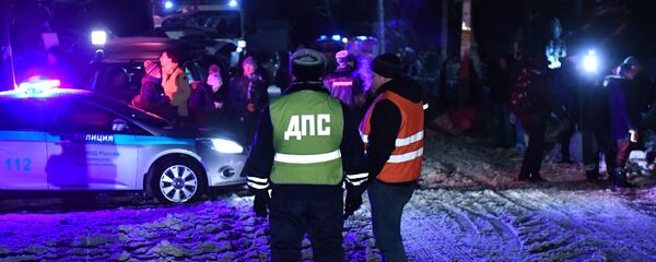 رجال الشرطة في مكان تحطة الطائرة إن-148 الروسية - سبوتنيك عربي
