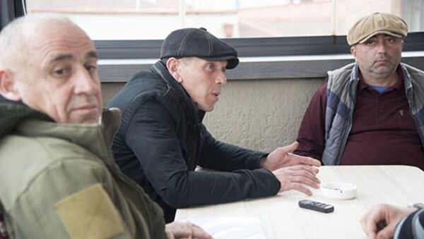 العسكريين الجورجيين: ألكسندر ريفازيشفيلي، وكوبا نيبرادزه، تريستان تسيتيلاشفيلي - سبوتنيك عربي