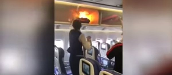 ركاب طائرة مدنية يخمدون حريق نشب على متنها ركاب طائرة مدنية يخمدون حريق نشب على متنها - سبوتنيك عربي