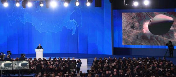 الرئيس الروسي فلاديمير بوتين خلال الرسالة السنوية للجمعية الفيدرالية - سبوتنيك عربي