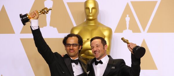 بريان فوغل يتسلم الأوسكار - سبوتنيك عربي