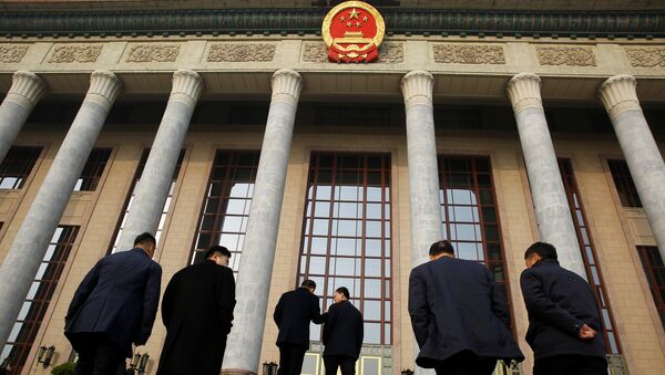 وصول المندوبون إلى الجلسة العامة الرابعة للمجلس الوطني لنواب الشعب في قاعة الشعب الكبرى في بكين 13 مارس/آذار 2018 - سبوتنيك عربي