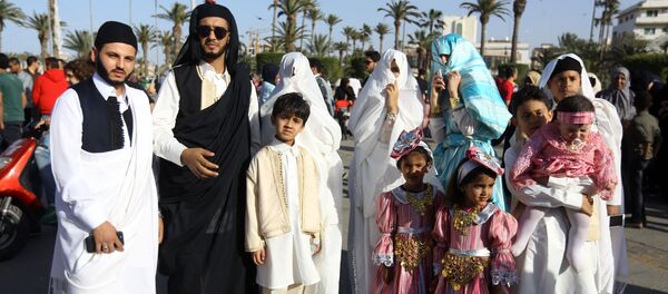 المشاركون في المهرجان الوطني للزي التقليدي في طرابلس، ليبيا 13 ماري/ آذار 2018 - سبوتنيك عربي