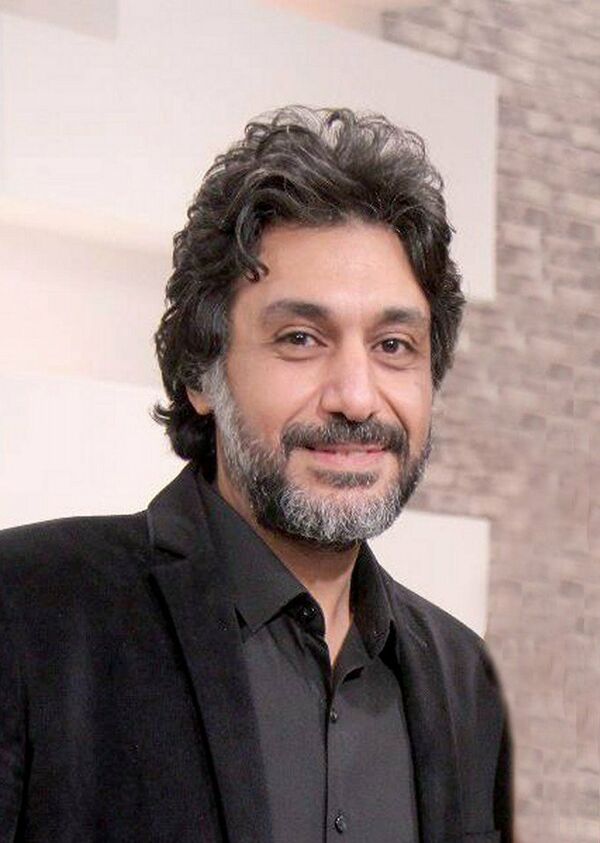 فنان الكاريكاتير المصري أحمد دياب - سبوتنيك عربي