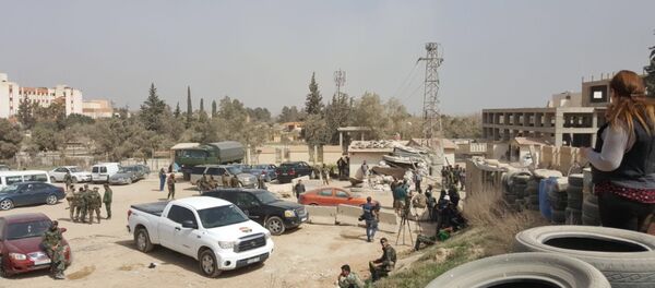 خروج حافلات تقل مسلحين من حرستا في الغوطة إلى إدلب، سوريا 22 مارس/ آذار 2018 - سبوتنيك عربي
