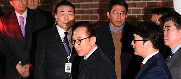 الرئيس الكوري الأسبق أثناء اقتياده للسجن 22 مارس/ آذار 2018 - سبوتنيك عربي