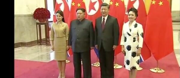 كيم جونغ أون وزوجته في زيارة للصين - سبوتنيك عربي