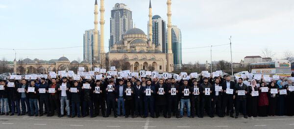 مدن روسيا تتضامن مع أهالي ضحايا حادث الحريق المروع مدينة كيميروفو، 27-28 مارس/ آذار 2018 - سبوتنيك عربي