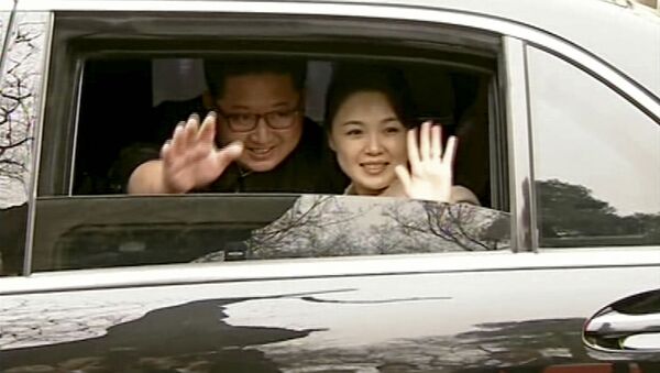 زعيم كوريا الشمالية كيم جونغ أون وزوجته في زيارة إلى الصين، 28 مارس/ آذار 2018 - سبوتنيك عربي