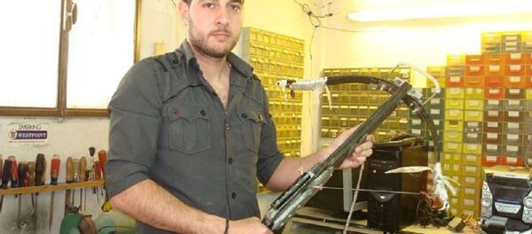 مهندس سوري شاب يصنع بندقية كهرومغناطيسية - سبوتنيك عربي