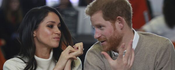 نجل ولي العهد البريطاني الأمير هاري وخطيبته الممثلة الأمريكية ميغان ماركل - سبوتنيك عربي