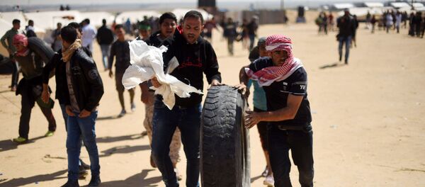 مسيرة العودة الكبرى على حدود قطاع غزة و إسرائيل، 2 أبريل/ نيسان 2018 - سبوتنيك عربي