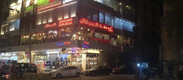 مقهى قهوة وكتاب في بغداد - سبوتنيك عربي