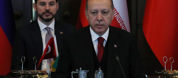 أردوغان خلال القمة الثلاثية التي جمعت روسيا وتركيا وإيران أردوغان خلال القمة الثلاثية التي جمعت روسيا وتركيا وإيران - سبوتنيك عربي