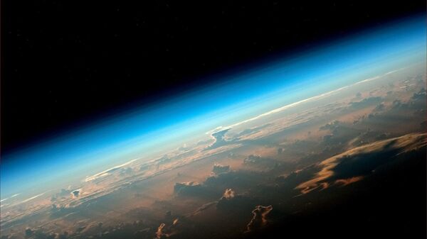 مشهد يطل على كوكب الأرض من محطة الفضاء الدولية. الصورة التقطها رائد فضاء روسكوسموس أوليغ أرتيمييف - سبوتنيك عربي