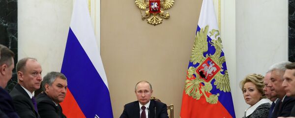 الرئيس الروسي فلاديمير بوتين خلال اجتماع مجلس الأمن الروسي - سبوتنيك عربي