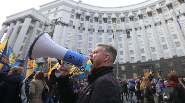 مشاركون في مظاهرات كييف ضد الأوليغارشية، أوكرانيا - سبوتنيك عربي