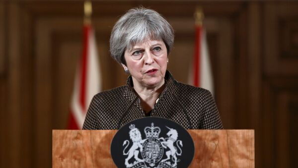 التحالف الثلاثي - مؤتمر صحفي لـ رئيسة الوزراء البريطانية تيريزا ماي حول سوريا، لندن 14  أبريل/ نيسان 2018 - سبوتنيك عربي
