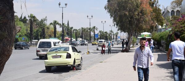 الحياة في دمشق بعد هجوم التحالف الثلاثي فجر اليوم، 14 أبريل/ نيسان 2018 - سبوتنيك عربي
