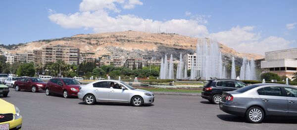 الحياة في دمشق بعد هجوم التحالف الثلاثي فجر اليوم، 14 أبريل/ نيسان 2018 - سبوتنيك عربي