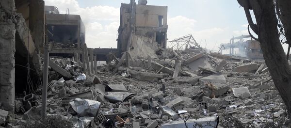 ضربات التحالف الثلاثي التي طالت مركز البحوث العلمية في برزة، سوريا 14 أبريل/ نيسان 2018 - سبوتنيك عربي