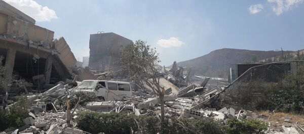 ضربات التحالف الثلاثي التي طالت مركز البحوث العلمية في برزة، سوريا 14 أبريل/ نيسان 2018 - سبوتنيك عربي