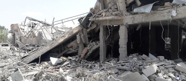 ضربات التحالف الثلاثي التي طالت مركز البحوث العلمية في برزة، سوريا 14 أبريل/ نيسان 2018 - سبوتنيك عربي