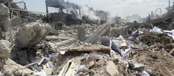 ضربات التحالف الثلاثي التي طالت مركز البحوث العلمية في برزة، سوريا 14 أبريل/ نيسان 2018 - سبوتنيك عربي