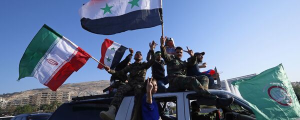 مظاهرات في دمشق بعد ليلة من هجوم التحالف الثلاثي، سوريا 14 أبريل/ نيسان 2018 - سبوتنيك عربي