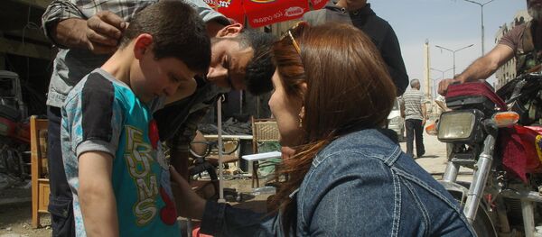 طفل يشارك بالمسرحية الكيماوية - سبوتنيك عربي