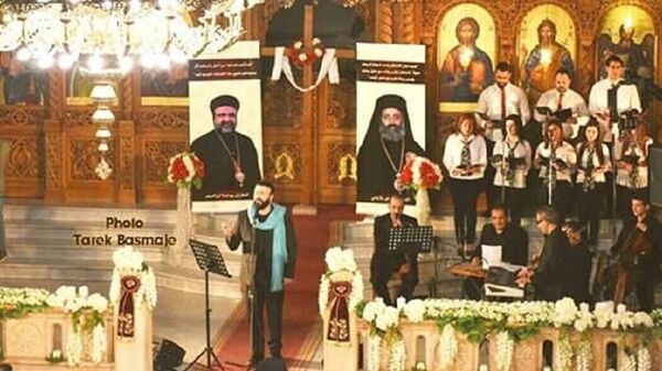 غبريال عبد النور يرنم في حلب .. لعودة المطرانين المخطوفين - سبوتنيك عربي